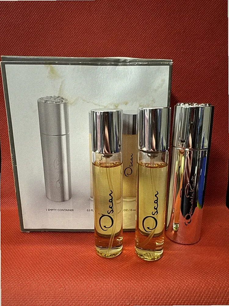 Oscar de la Renta Perfumes and Container 15ml each/ The Box Is Damaged